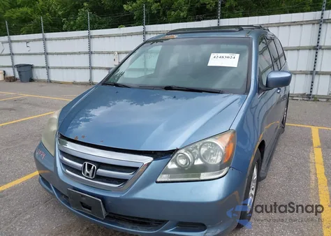 2009 Honda Odyssey Ex-L z USA, uszkodzony, nr VIN 5FNRL38769B008104